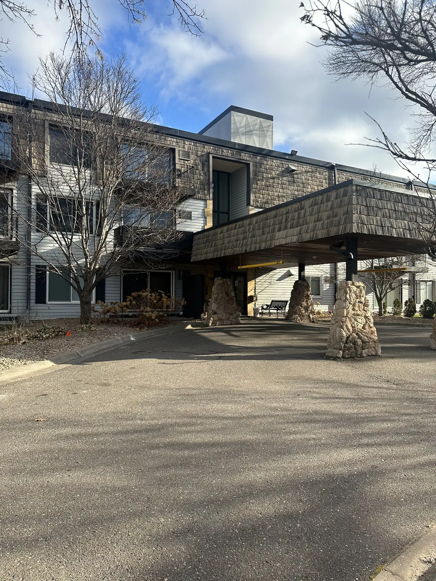 Entrance canopy of the office building at 183 Little Canada Rd E, Little Canada, Minnesota, where Andrade Law has its office