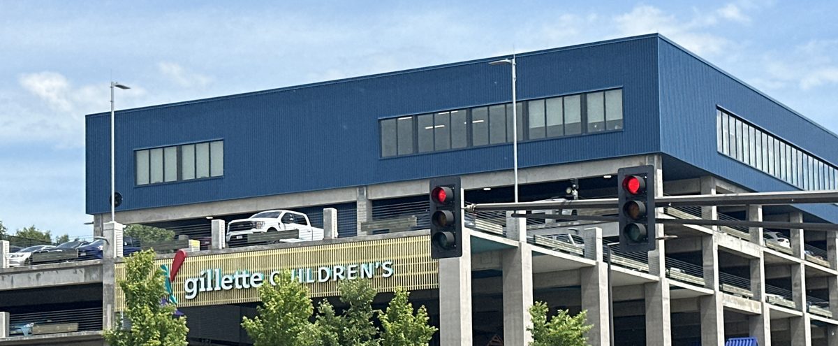 Parking ramp structure and signage at Gillette Children's in Saint Paul &mdash; the public entrance is on Level D of the Regions Hospital West Ramp