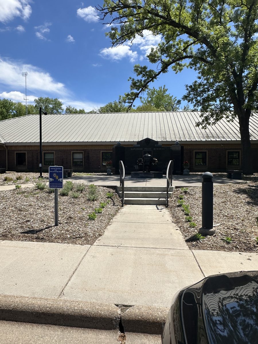 Sidewalk approach to the Maplewood Police Memorial plaza and Maplewood City Hall at 1830 County Road B East