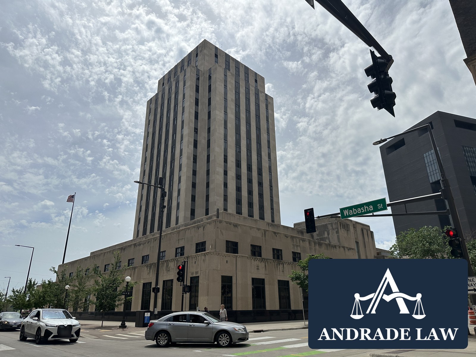 Ramsey County Courthouse in downtown Saint Paul with Andrade Law branding