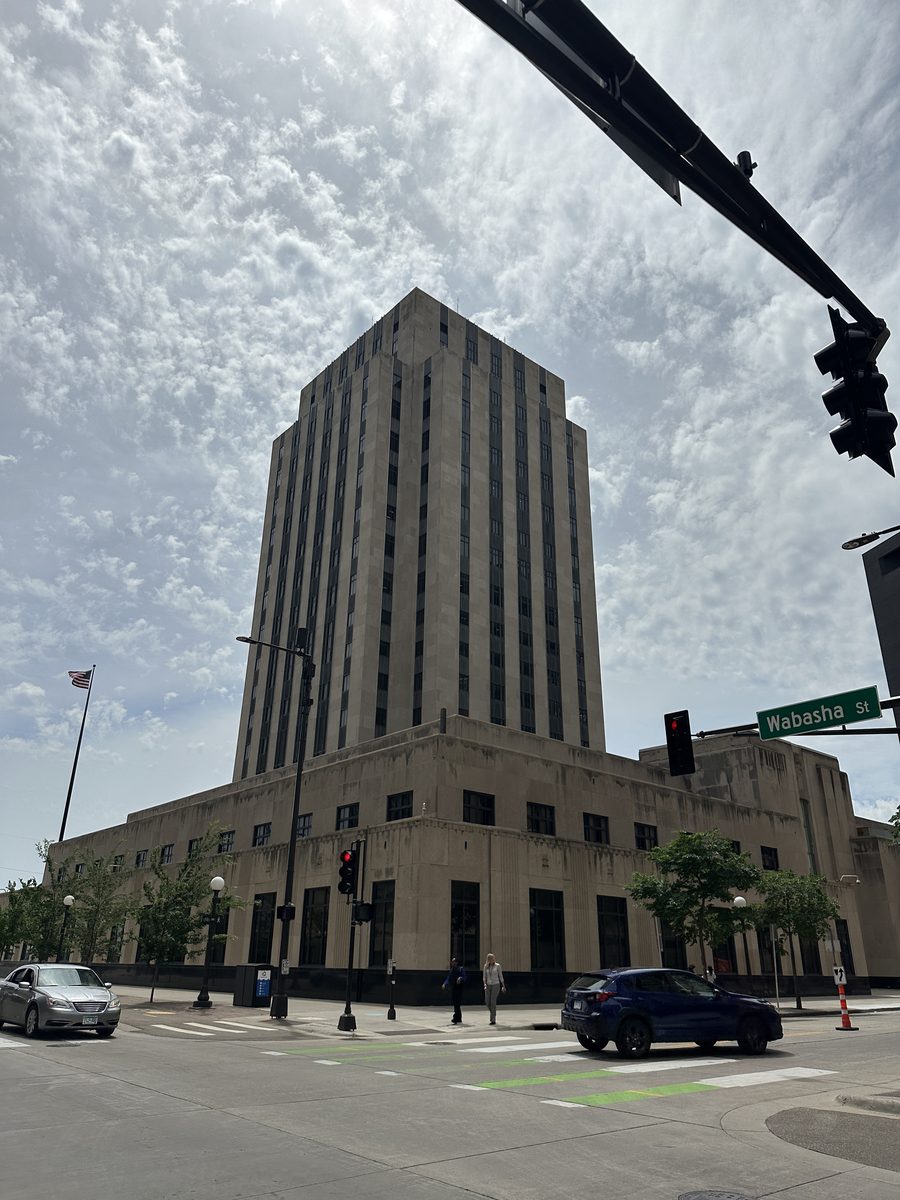 The Ramsey County Courthouse and Saint Paul City Hall tower seen from the Wabasha Street intersection in downtown Saint Paul