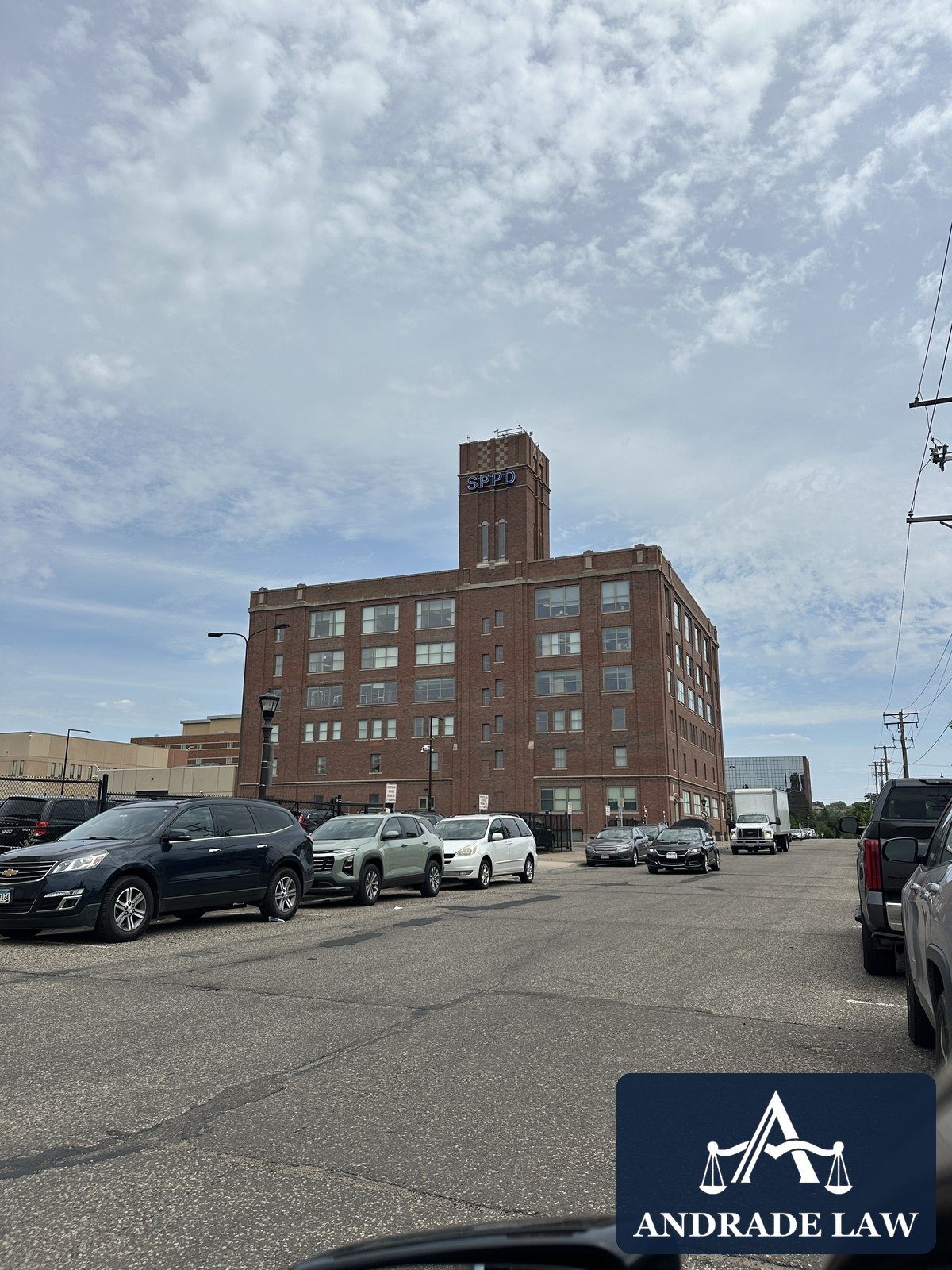 Saint Paul Police Department Headquarters exterior with Andrade Law branding
