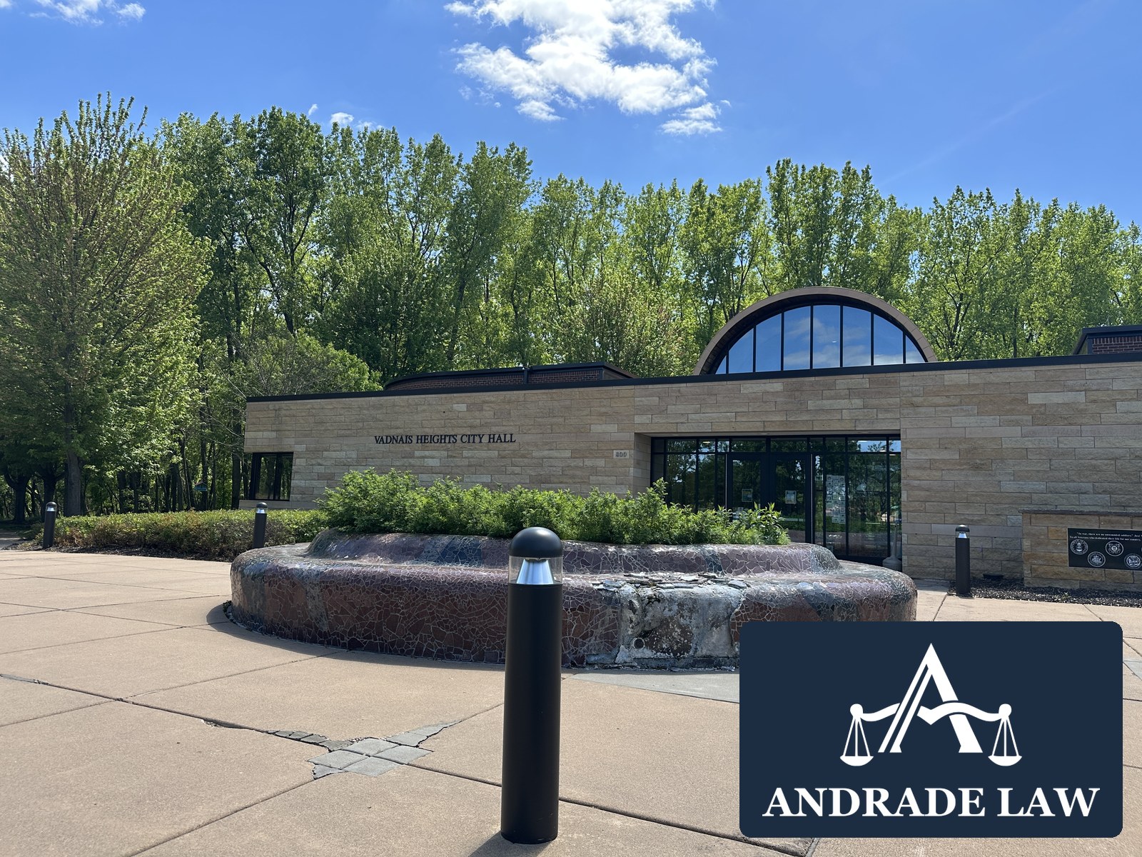 Vadnais Heights City Hall exterior with Andrade Law branding